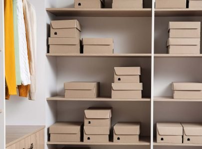 A picture of boxed shoes on a shelf